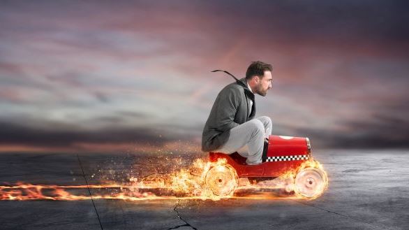 Fast businessman with a car wins against the competitors.