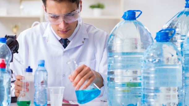 Lab assistant testing water quality