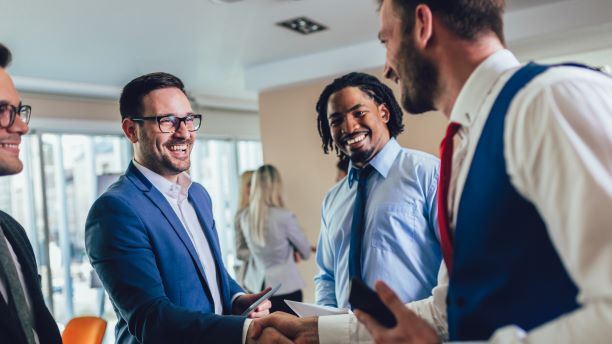 Investors shaking hands after a meeting