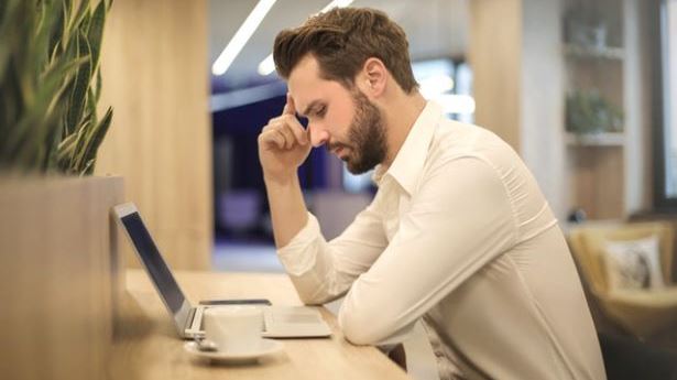 An employee looking at mistakes he's made making his companies R&D tax credit claim
