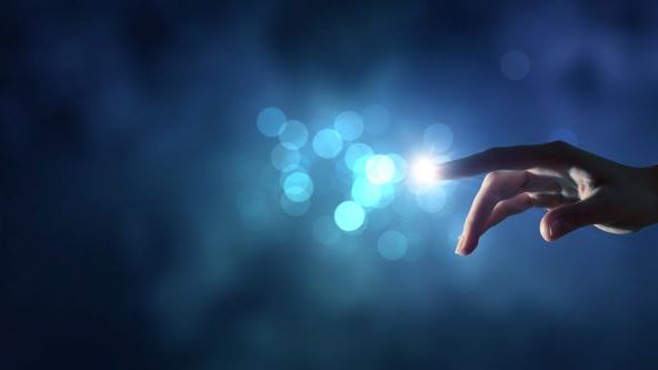 Hand pointing at light