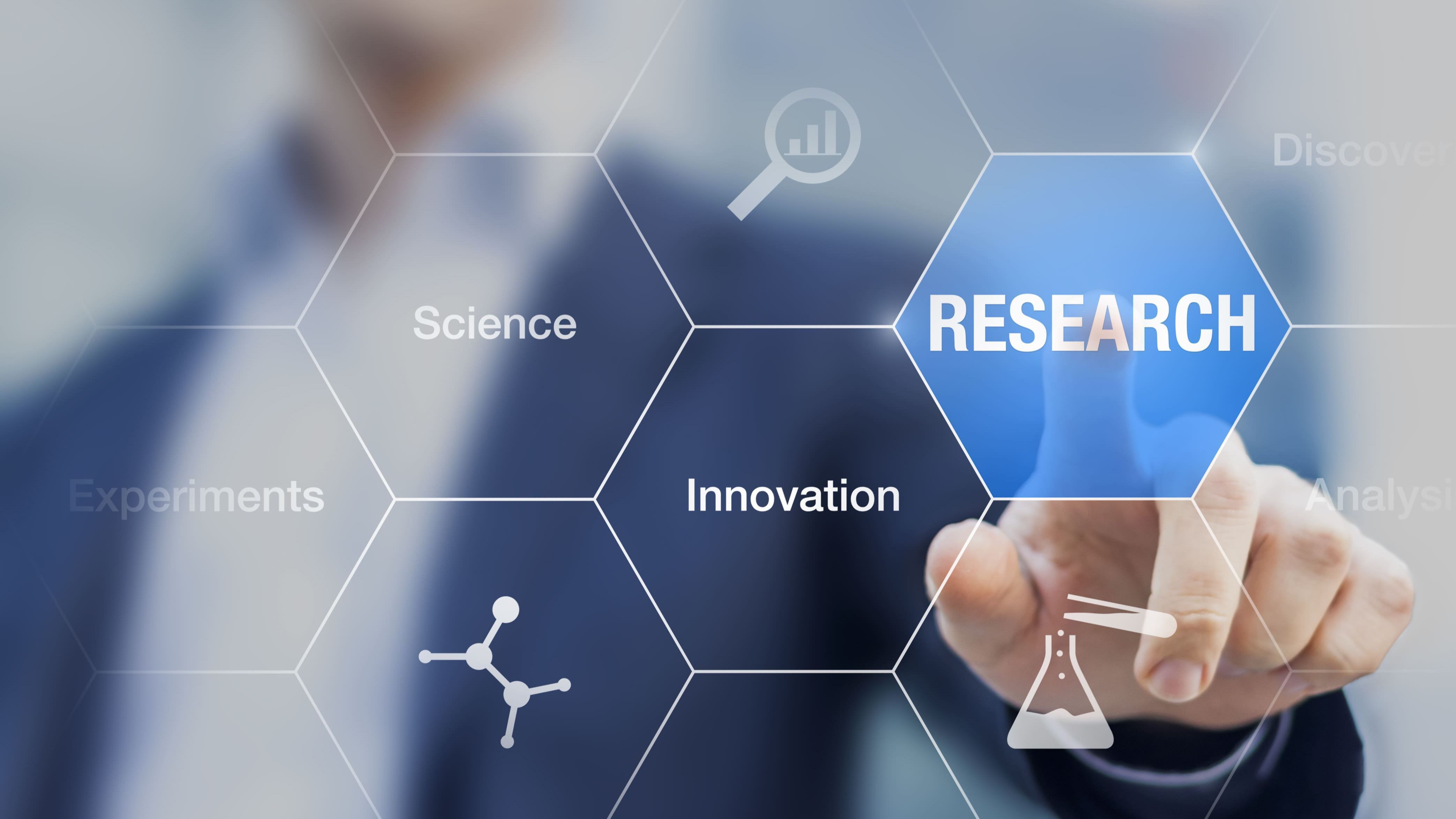 Business man touching a screen relating to research