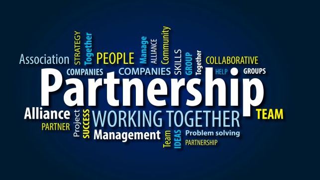 The word partnership in white letters surrounded by other similar words