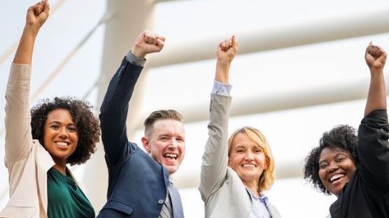 A group of employees celebrate receiving their R&D tax credit claim