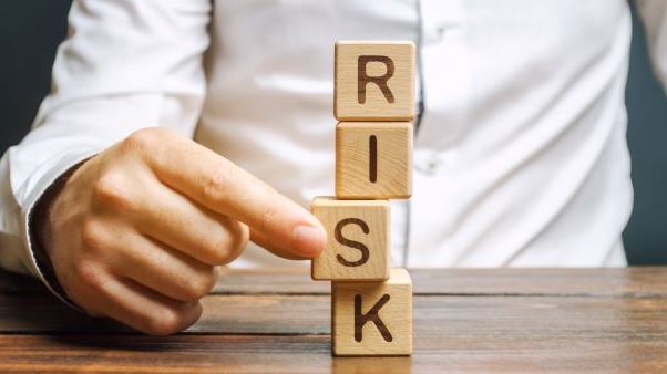 Wooden blocks spelling RISK