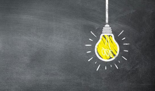 Lightbulb drawn on chalkboard